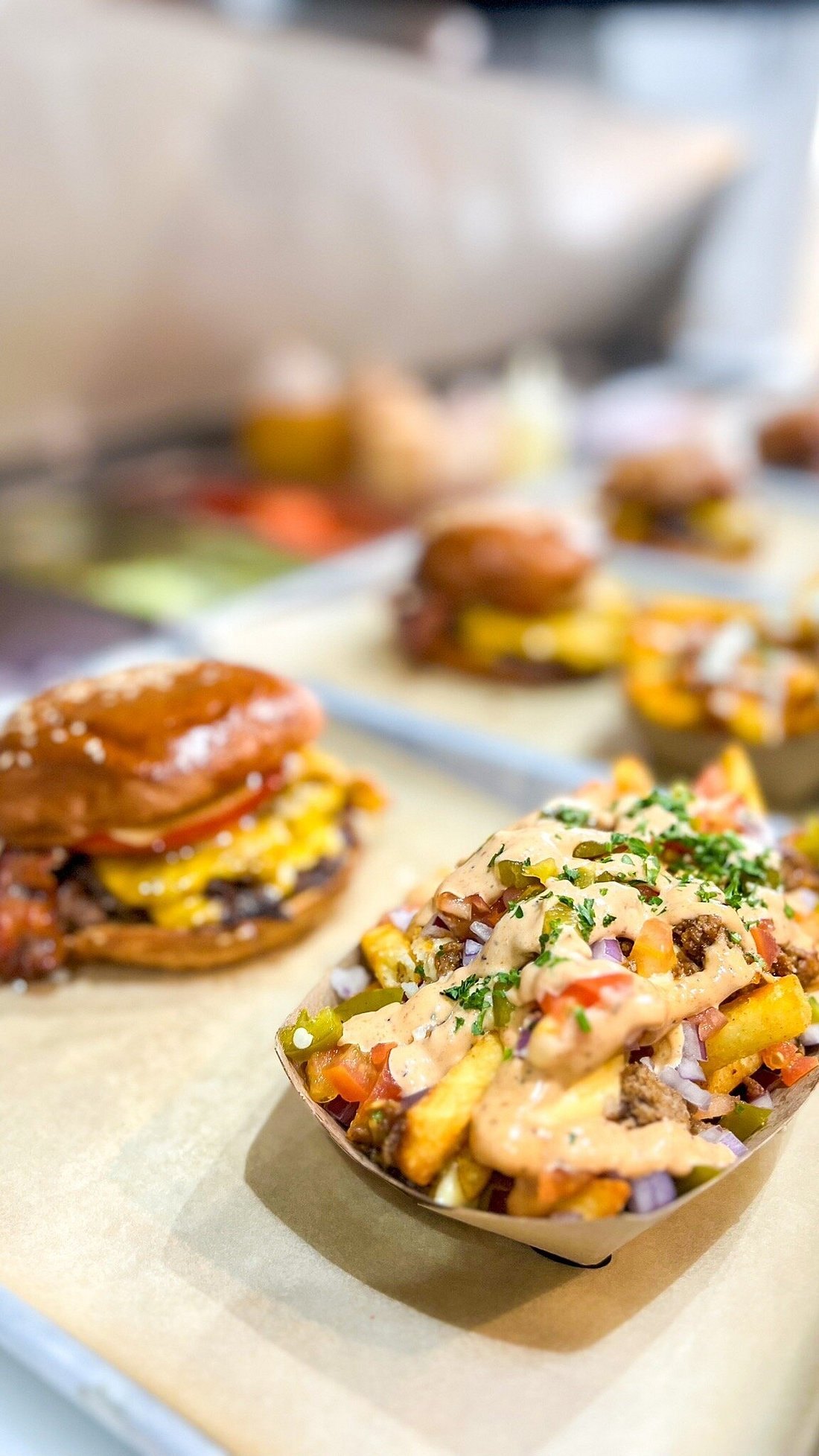 Loaded fries and a pretzel-bun cheeseburger at BRGR HAUS Curaçao