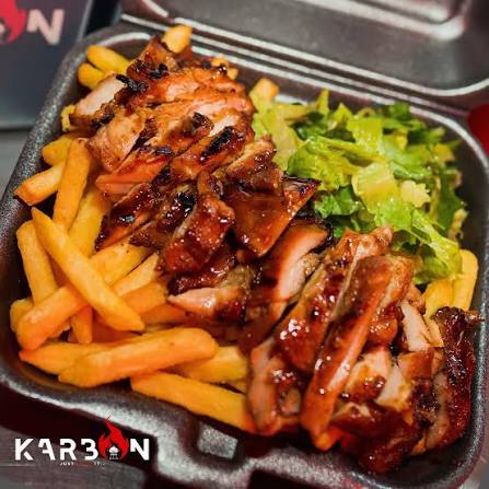 Karbon Curaçao — grilled steak platter with fries and salad
